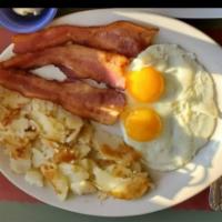 #2. Two Eggs · Served with three strips of bacon, sausage or ham, hashbrowns or Obrien potatoes, and two pa...