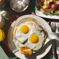 #3. Biscuits and Gravy · Served with 2 eggs.