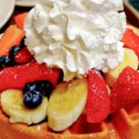 Jenny's Waffle · Strawberries, bananas, blueberries and whipped cream.