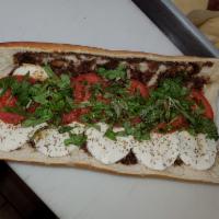 Lady Cafe Special Cold Sub · Fresh mozzarella, sweet plum tomatoes and hearty basil, drizzled with olive oil and balsamic...