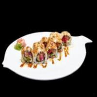 Texas Roll · Raw. Salmon, tuna, jalapeno, and cucumber inside with eel sauce and spicy mayo on top.