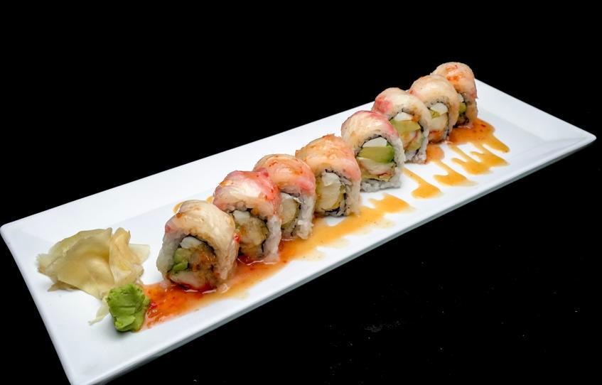 Sweet Lobster Roll · Raw. Lobster, cream cheese, and avocado inside, red snapper on top with chili sauce and spicy mayo sauce.