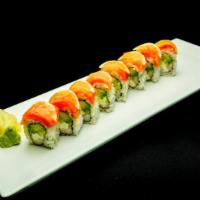 Sunset Roll Smoked · Crab, cucumber, avocado, and cream cheese inside, smoked salmon and lemon slices on top.