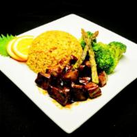 Beef Teriyaki Dinner · Grilled New York strip with light teriyaki sauce, steamed broccoli, fried asparagus and choi...