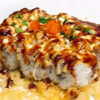Scallop Dynamite Maki · 6 piece California hosomaki topped with Scallop Dynamite mix and baked. Finished with teriya...