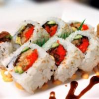 Soft Shell Maki · Uramaki with soft shell crab, avocado, masago, green onions and topped with our spicy sauce ...