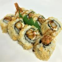 Crunchy Maki · Uramaki with shrimp tempura, kanimi crab and cucumber and rolled in tenkasu flakes. Finished...