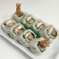 Tempura Maki · Uramaki with shrimp tempura, kanimi crab and cucumber. Finished with teriyaki sauce.