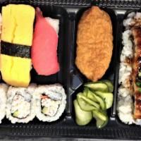 Unagi Bento  · Unagi, sushi rice, 3 piece California hosomaki, maguro, ebi, egg, inari and namasu.