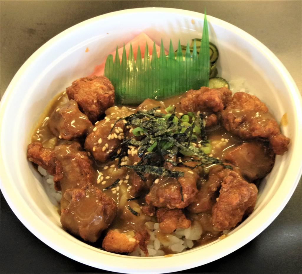 Curry Chicken Donburi · Sushi rice, karaage chicken, house curry, green onions, sesame seeds and nori.