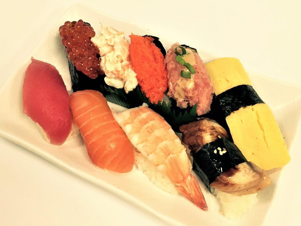 Sakura Nigiri Bento · 9 pieces. Maguro, salmon, ebi, unagi, ikura, scallop mayo, masago, spicy ahi, egg.