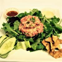Spicy Ahi Salad  · Mixed greens, spicy ahi, cucumbers, one ton chips, lion sauce (sweet chili sauce) and wasabi...