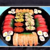 Deluxe Set · 42 pieces.  10 Maguro Nigiri, 5 Salmon Nigiri, 5 Ebi Nigiri, 5 Spicy Ahi Nigiri, 3 Scallop M...