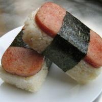 Spam Sushi · Spam musubi with sushi rice and teriyaki sauce.