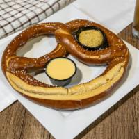 Giant Soft Pretzel · Served warm and soft with beer cheese and brewers mustard relish. 