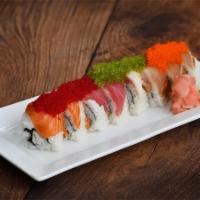 Atlantic Lover · Snow crab and cream cheese inside, topped with salmon, tuna, white tuna (escolar), flying fi...