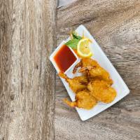 Butterfly Shrimp (5 pcs) · The crunchy fried Butterfly Shrimp served with house-made sweet and sour sauce.