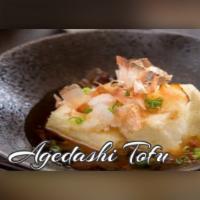 Agedashi Tofu · 5pieces. Lightly fried tofu served in flavorful dashi sauce with green onion and bonito flak...