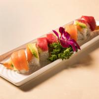  Hon Roll · Filled with shrimp tempura, crabmeat, avocado and topped with tuna, salmon, avocado, eel sau...
