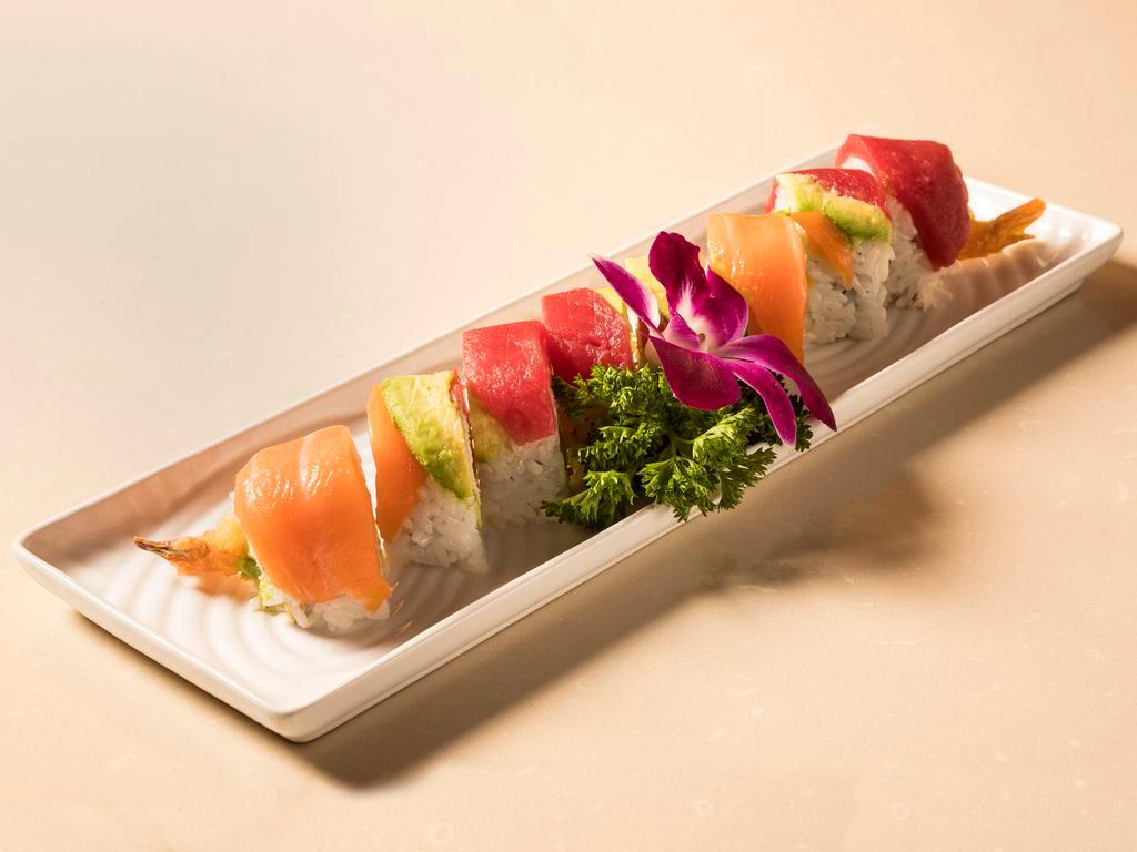  Hon Roll · Filled with shrimp tempura, crabmeat, avocado and topped with tuna, salmon, avocado, eel sauce and spicy mayo.