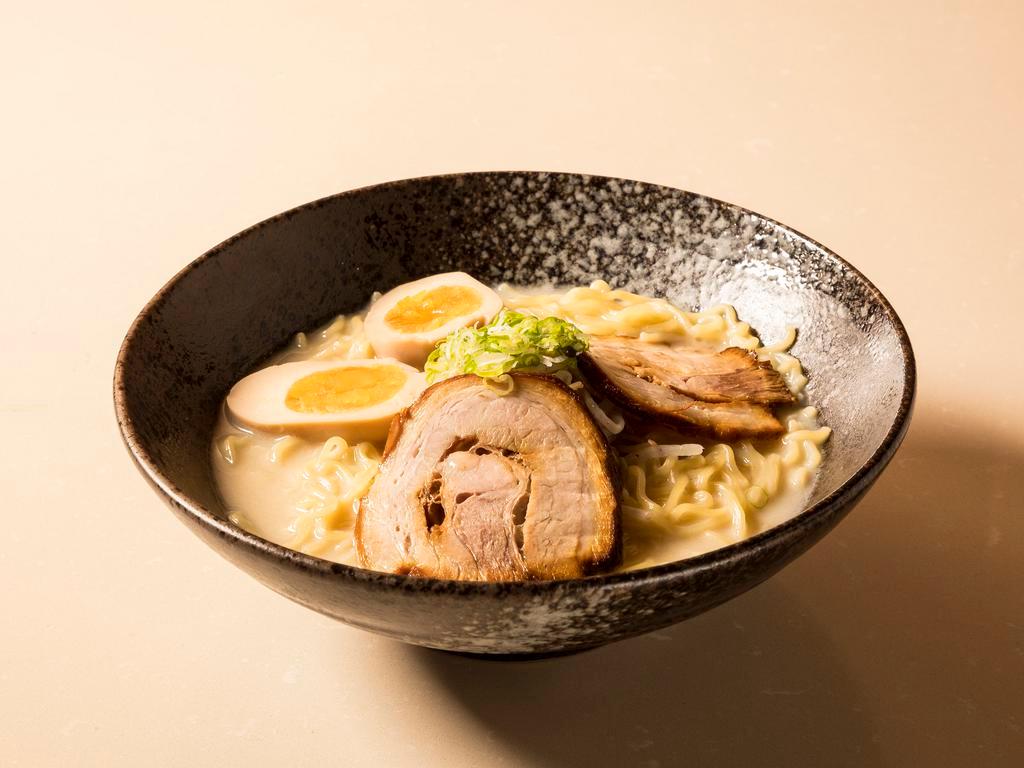 25. Hon Ramen · The original pork broth with chef's made dashi, thin noodles topped with pork chashu, a marinated egg, bamboo spears and bean sprouts.