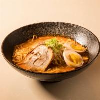27. Spicy Garlic Miso Ramen · Pork broth with chef's special blend of miso, hot spices and thin noodles topped with pork c...