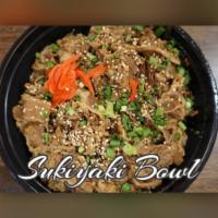 Sukiyaki Bowl · Steamed rice with slow-braised beef sukiyaki, mushrooms, onions, green onions and tofu.