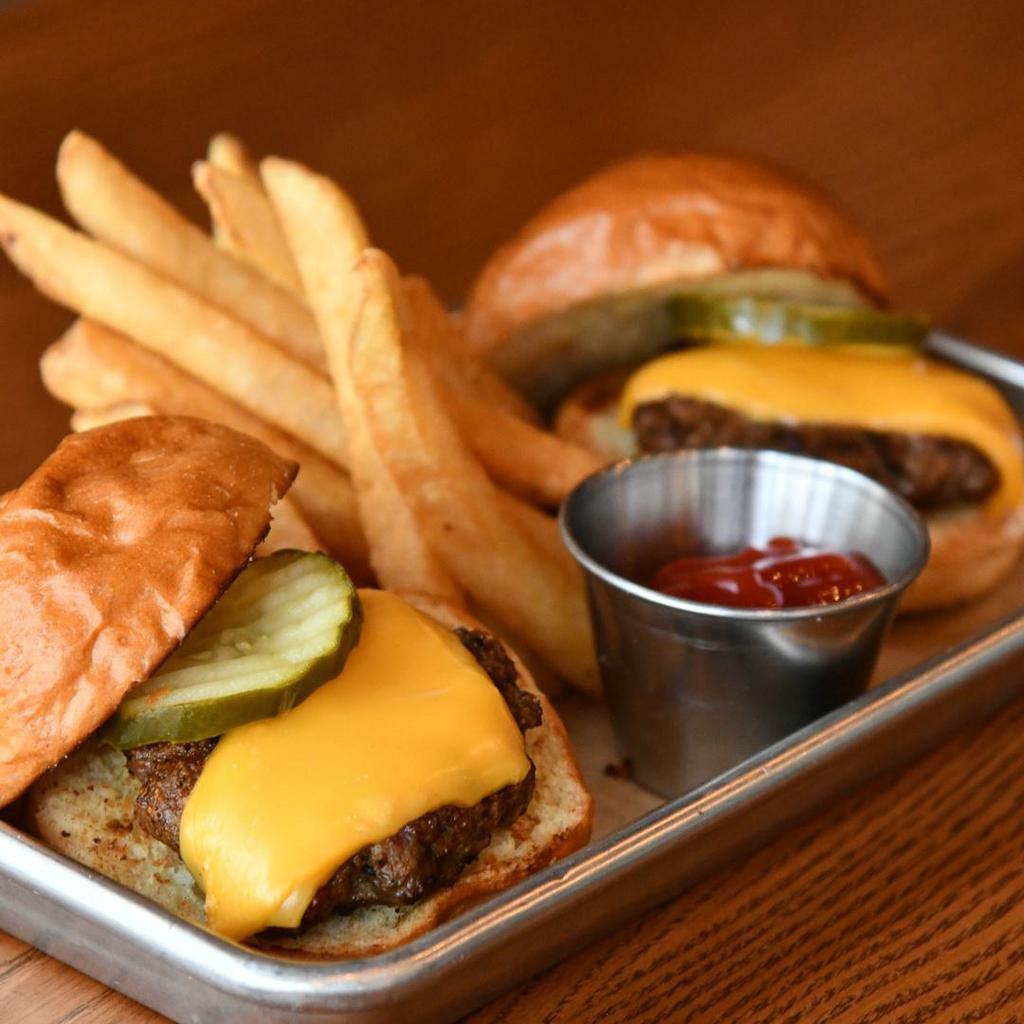 Sliders · 2 Mini burgers with American cheese.