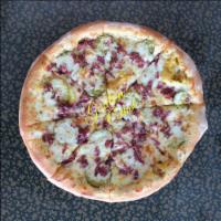 Pastrami Pizza · Beef Pastrami, Pickle Chips and Mustard Sauce.