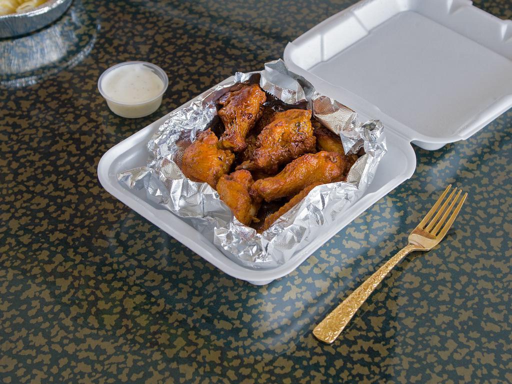 Wings · Includes choice of sauce.