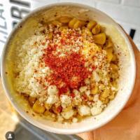 Esquite · corn off the cob served in cup with mayo, cotija cheese and chili powder