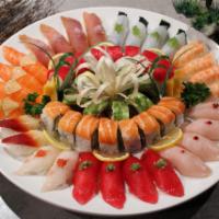 Party B Platter · Assorted Sushi (30 Pcs) and Roll (24 Pcs) 

-Roll - (Mickey, D.D, Tuna Dragon)

Sushi- Tuna(...