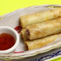 Spring Rolls · Golden brown spring rolls stuffed with vegetables served with plum sauce.