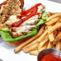 Santa fe Grilled Chicken Sandwich · Melted pepper jack cheese, roasted red peppers and spicy mayo on a brioche bun, served with ...