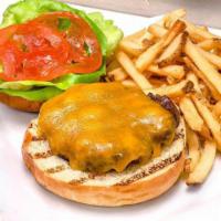 Cheeseburger · Cheddar, lettuce, tomato and brioche bun, served with fries