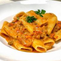 Rigatoni with Vodka Sauce · Ground beef, bell peppers, parsley and creamy vodka red pepper sauce.