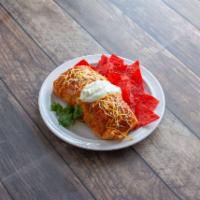 Breakfast Burrito · A large burrito with eggs, sausage, Jack cheese, bacon, potatoes and ranchero salsa served w...