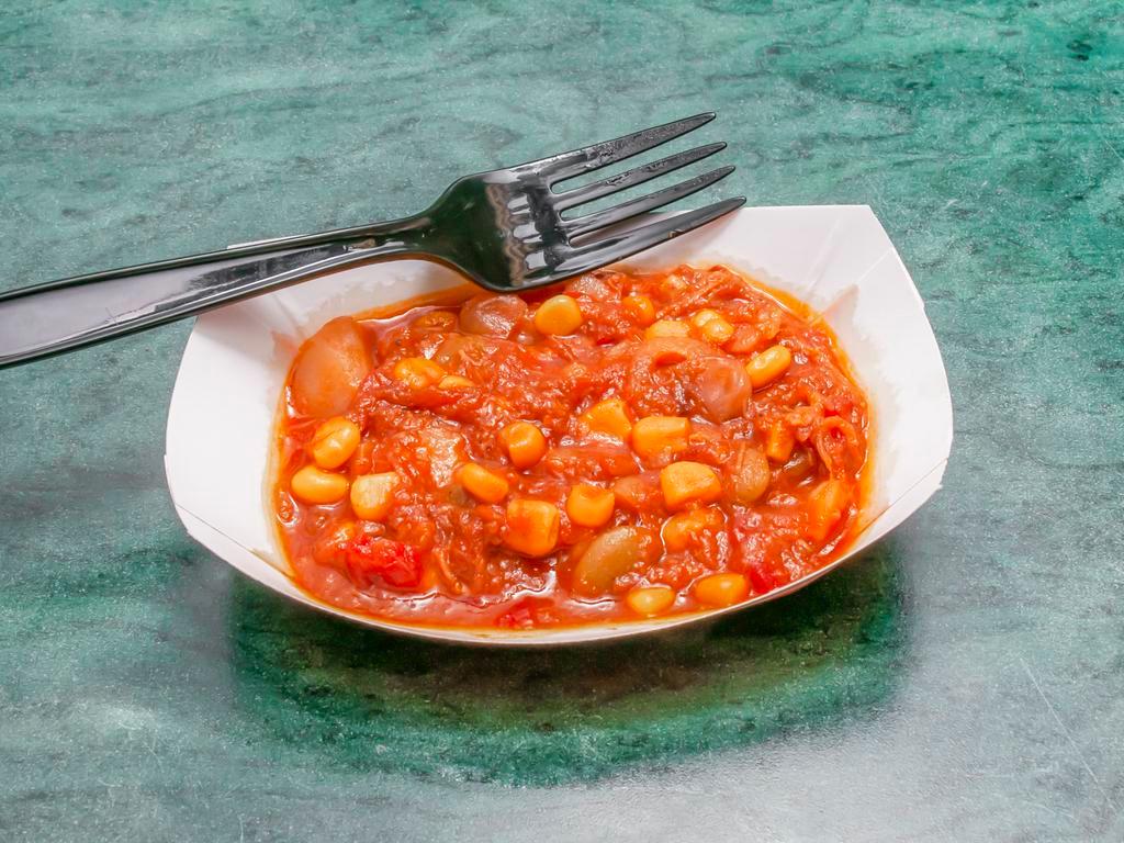 Bowl of Brunswick Stew · made with all of your favorite veggies and BBQ this stew is one of a kind!
