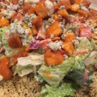 Buffalo Chicken Salad · Romaine, Roma tomatoes, carrots, red onions crispy Buffalo chicken, crumbled blue cheese and...
