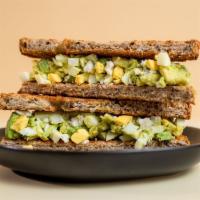 The Egg Salad Sandwich · Toasted Sprouted Bread, Hard-Boiled Egg, Avocado, Feta, Himalayan Pink Salt, Black Pepper & ...