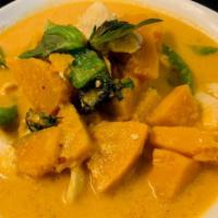 Pumpkin (Chicken Or Tofu) Curry · Red curry paste, pumpkin, fresh Thai basil, and bell peppers, your choice of either Chicken ...