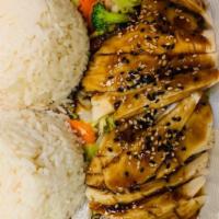 Chicken Teriyaki · Grilled chicken breast, topped with a house made Teriyaki sauce, steamed veggies, served wit...
