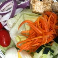 Thai Salad · Lettuce, tofu, eggs, tomatoes, cucumbers, carrots and red onions with side of peanut dressin...