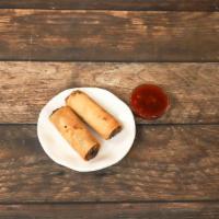 Vegetarian Spring Rolls · 2 pieces. Mixed vegetables rolled in a crispy blanket.