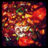 Dry Chicken Manchurian · Boneless pieces of chicken cooked in our house special manchurian sauce with onions and cila...