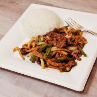 Beef Pepper Steak · Strips of meat cooked in our brown pepper sauce, sauteed with onions and bell peppers. Hot a...