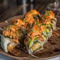 R2. Henry Special Roll · Shrimp tempura, cream cheese, jalapeno inside and eel and avocado on the outside topped with...