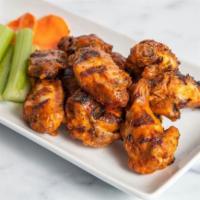 Sticky BBQ WIngs · 10 Wings, smoked then grilled to order. Served with choice of smoked bleu cheese or herbed r...