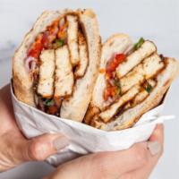 Vegan Bahn YU · Glazed Tofu, Pickled Vegetables, Spicy Vegan Mayo, Cilantro, Fresh Baguette
