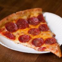Pepperoni Pizza Slice · Thick cut pepperoni, house mozzarella, shaved Parmesan and red sauce. 